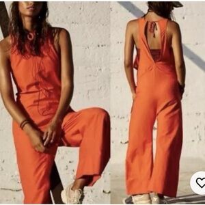 Free people by FP Movement break away jumpsuit Vibrant Orange wide leg size S/p